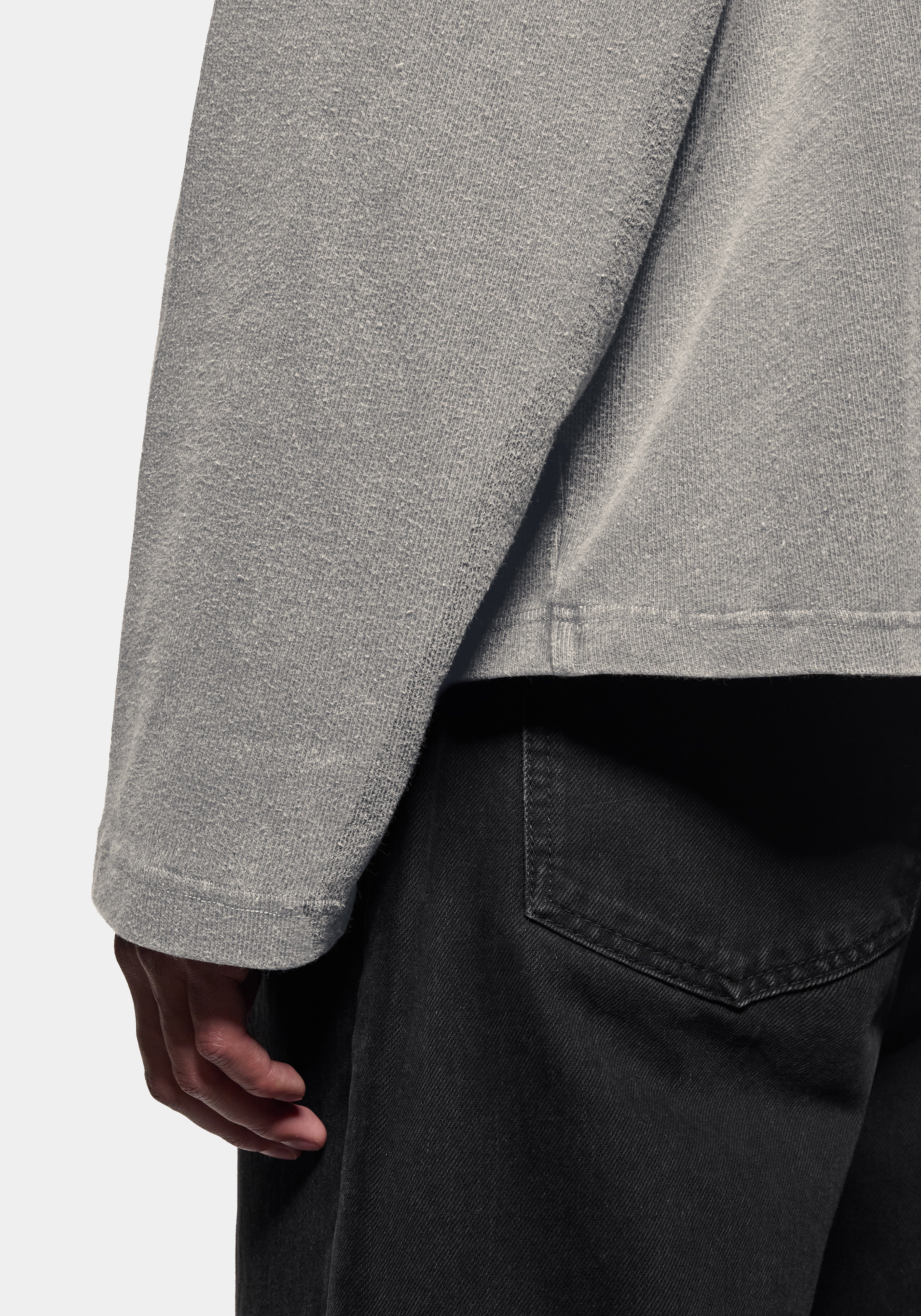 Close-up of the open cuff on the heavyweight cotton jersey