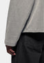 Close-up of the open cuff on the heavyweight cotton jersey